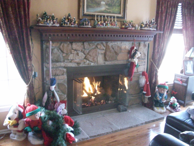 Gas Log Conversion, New Hearth Stones, Refinished Glass Doors, Cultured Stone, Reconditioned Mantel