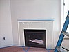 GLASS TILE SURROUND INSTALLED